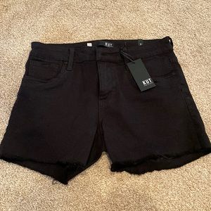 Black denim shorts